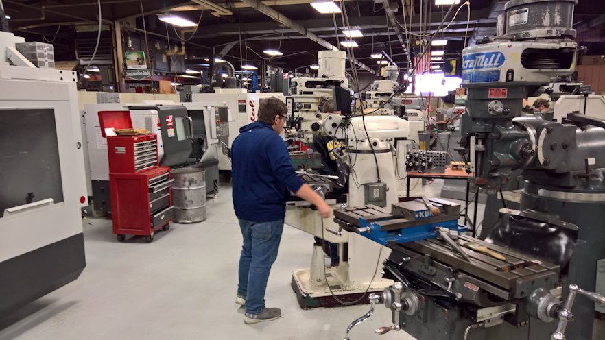 Students in School Activites (Athletics, Classrooms, Plays, Band, Art Projects) (PHS Student at Heartland Career Center Machine Shop.jpg)